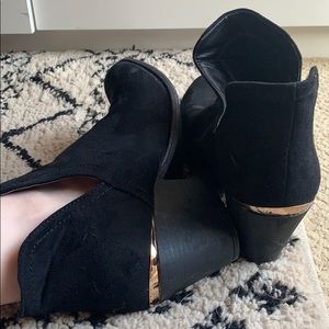 Black booties with gold trim